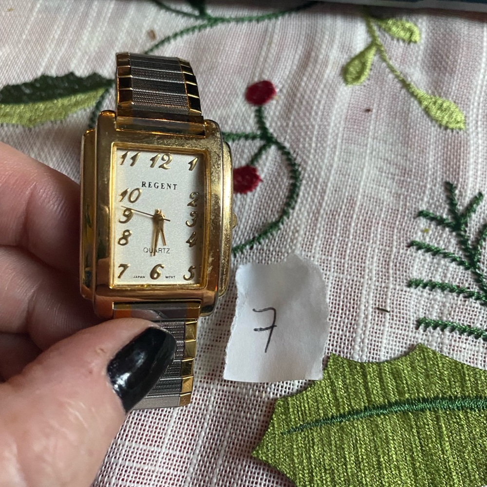 Regent, gold and silver tone ladies watch.